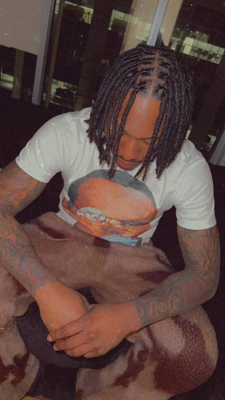 Client sitting with shoulder-length locs